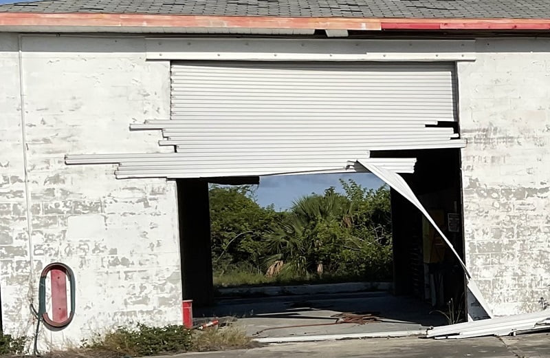 buliding commercial door destroyed by hurricane